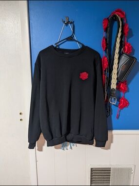 Original Deluxe Black Crewneck Sweater with Red Rose Patch